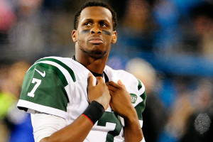 CHARLOTTE, NC - DECEMBER 15:  Geno Smith #7 of the New York Jets watches the scoreboard during the final minute of a loss to the Carolina Panthers at Bank of America Stadium on December 15, 2013 in Charlotte, North Carolina. The Panthers won 30-20.  (Photo by Grant Halverson/Getty Images)